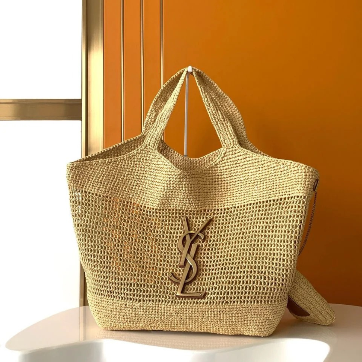 YVES SAINT LAURENT ICARE-TASCHE AUS BAST