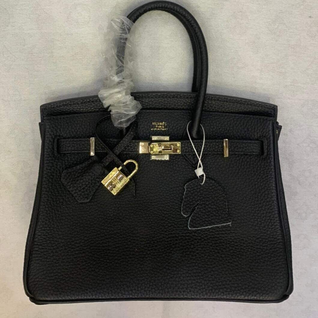 HERMÈS BIRKIN 25 TASCHE MIT GOLDENEN BESCHLÄGEN IN SCHWARZ