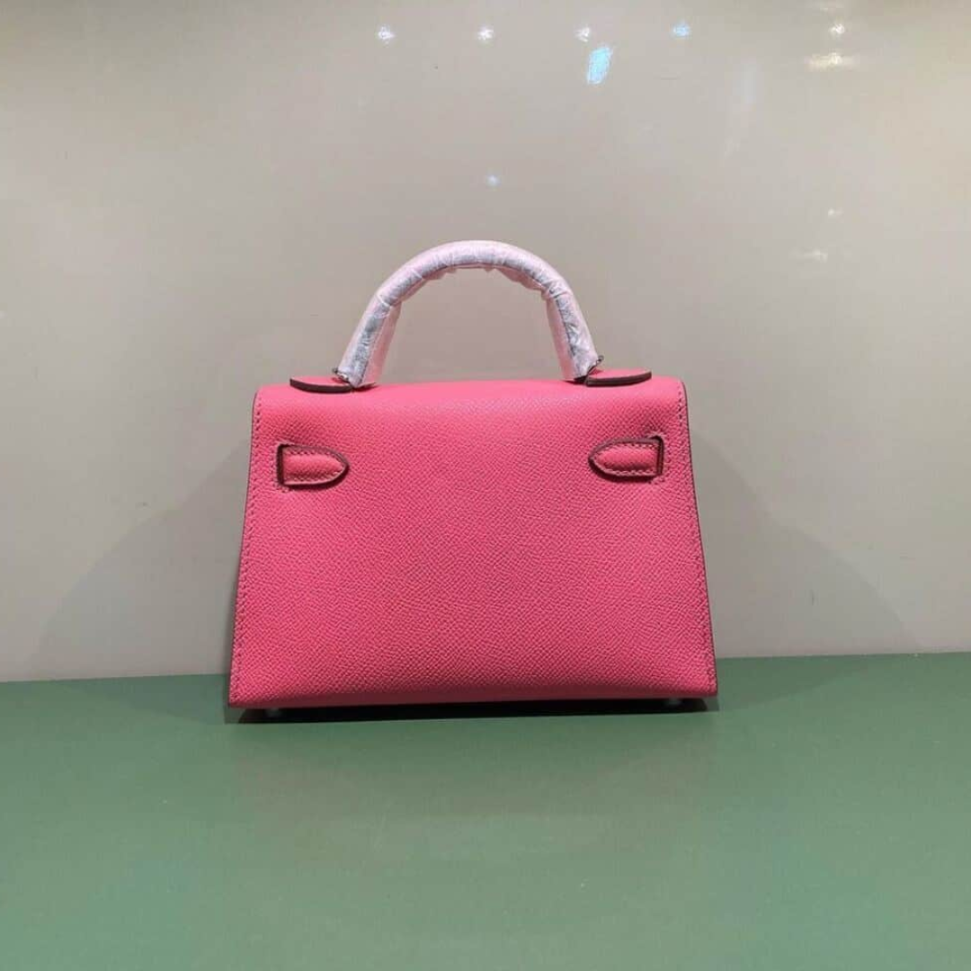 HERMÈS KELLY 20 TASCHE MIT GOLDENEN BESCHLÄGEN IN ROSA