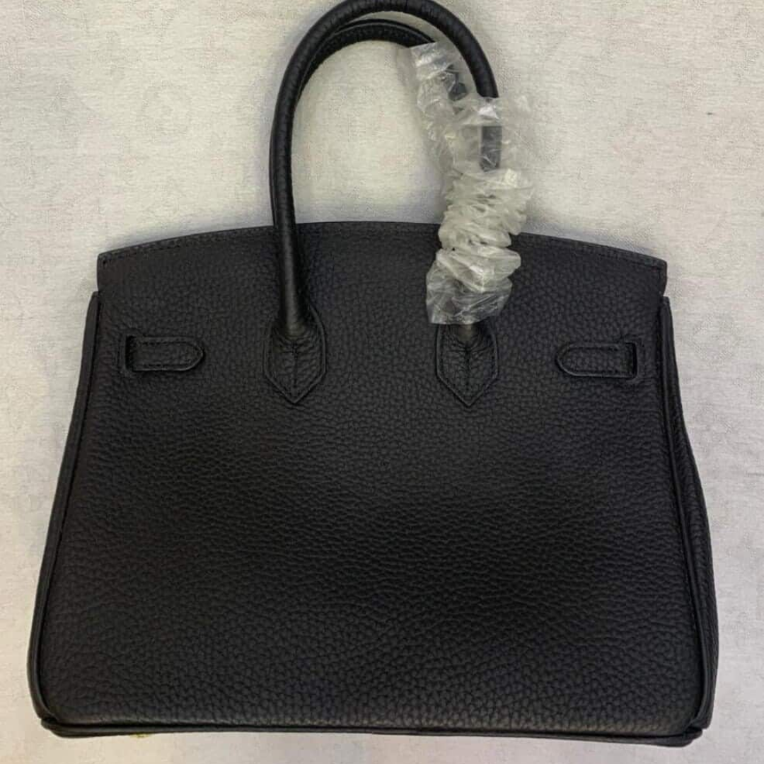 HERMÈS BIRKIN 25 TASCHE MIT GOLDENEN BESCHLÄGEN IN SCHWARZ